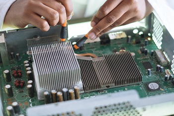 person fixing a computer